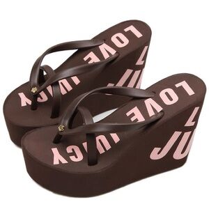Juicy Couture "Love Juicy" wedge platform flip-flops.
